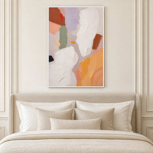 Soft textured canvas adds quiet warmth above an ivory bed.