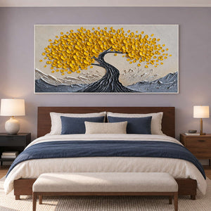 Yellow canopy painting above a bed with navy bedding.