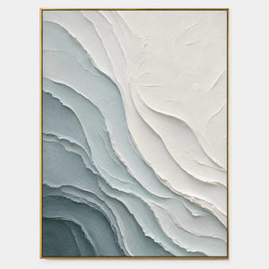 Hand-painted textured coastal wall art in blue-gray and chalk white.