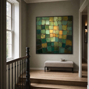 Square green abstract wall art styled on a London stair landing.