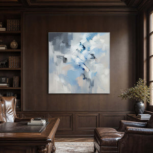 Luminous blue textured painting displayed in a refined dark wood office.