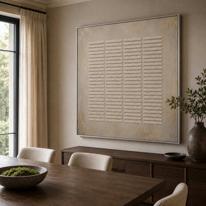Soft neutral textured art in a serene bathroom space.