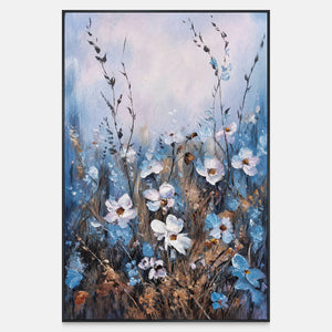 Front view of white and blue wildflowers on slender stems beneath a broad pale upper area, with a black frame.