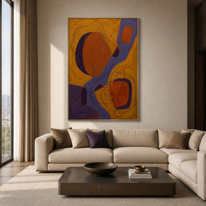 Ochre and violet abstract wall art styled in a modern living room.