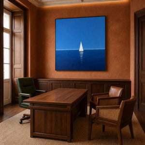 Blue sailboat wall art displayed in a richly toned home office.