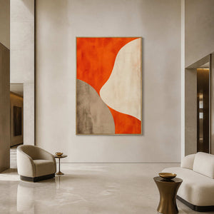 Orange Curves Hold the Center in a gold-framed lobby