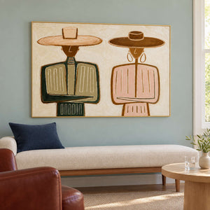 Green-and-pink artwork above a cream bench against a green wall.