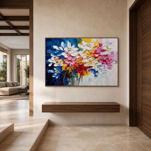 Horizontal floral artwork displayed in a pale stone walnut entry hall.