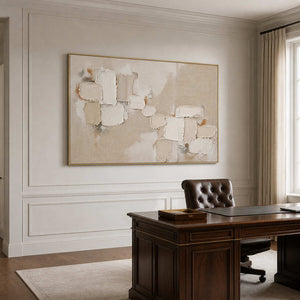 Soft neutral abstract wall art in a private office with a gold frame.