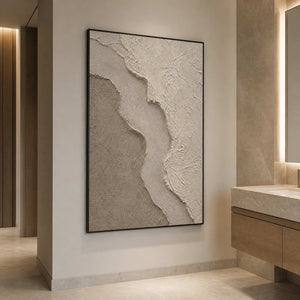 Vertical wabi sabi wall art in a refined bathroom with a black frame.