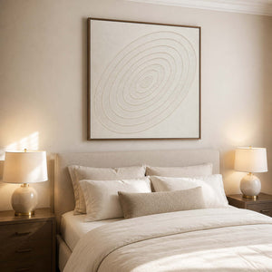 Calm ivory textured wall art displayed above a luxury primary bedroom.