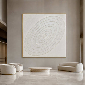 White textured Wabi Sabi wall art displayed in an upscale hotel lobby.