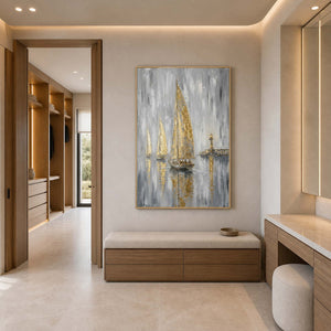 Gray and gold coastal wall art displayed in a refined bathroom.