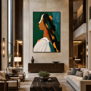Vertical modern portrait art displayed in a spacious contemporary hotel lobby.