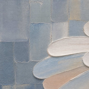 Close detail of sculpted tutu petals and layered blue gold paint
