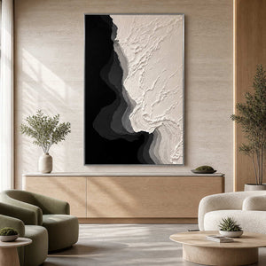 Silver framed textured abstract painting above a cabinet in a wellness reception lounge.