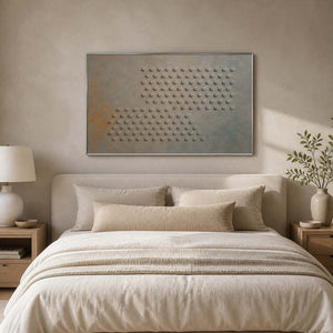 Minimalist geometric painting displayed above a serene neutral bedroom.