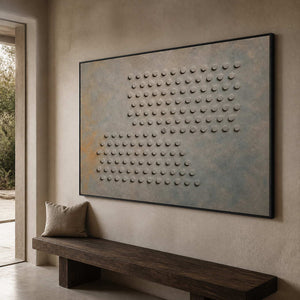 Horizontal textured wall art displayed along a quiet modern hallway.