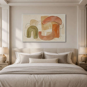 Olive and terracotta boho wall art styled above a serene bed.