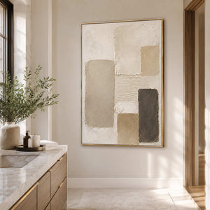 Soft neutral textured art in a serene bathroom space.