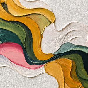 Detail of yellow, pink, and green folds converging at a narrow center between white areas.