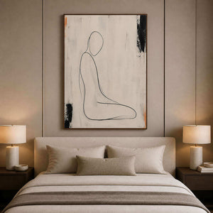 Quiet minimalist figure canvas styled above a soft neutral bed.