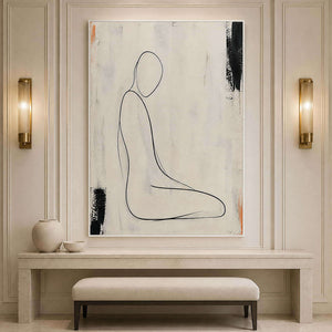 Minimal seated figure painting in an elegant hotel hallway.