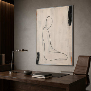 Restrained black line artwork bringing calm focus to an office.