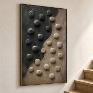 Tall earth-toned abstract canvas displayed beside a light wood staircase.