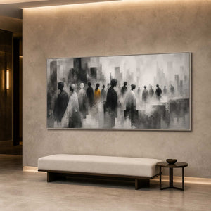 Large monochrome figurative wall art in an upscale hotel reception.