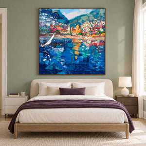 Blue bay artwork above a bed with plum bedding accents.