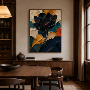 Bold black flower wall art displayed in a deep walnut dining room.