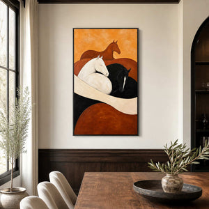 Black framed horse painting beside a wooden dining table and arched drinks cabinet.