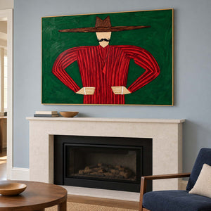 Moustached portrait above a pale fireplace on a blue-gray wall.