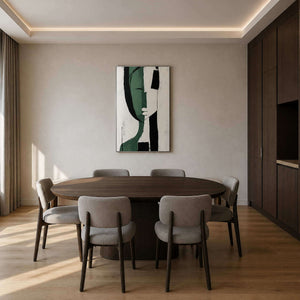 Graphic green abstract artwork displayed in a dark wood dining room.