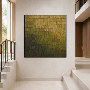 Textured green and charcoal artwork beside a modern staircase.