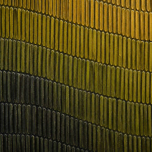 Close-up of repeated olive, ochre, and charcoal raised paint marks.