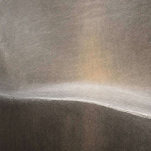 Detail of The Horizon Keeps One Glow, showing the pale horizon line and smoky textured surface.