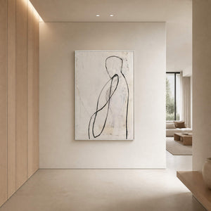 Minimalist vertical canvas styled in a bright cream residential entryway.