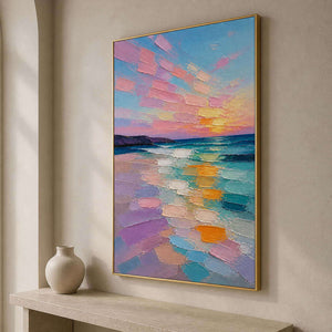 Luminous sunset seascape above a minimalist entryway console.