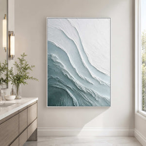 Vertical ocean inspired artwork in a calm modern bathroom
