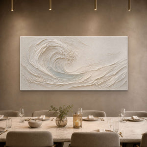 Textured coastal wall art displayed in a private boutique hotel dining room.