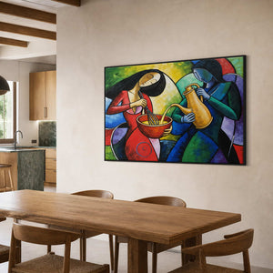 Modern cooking scene wall art displayed in an open kitchen and dining area.