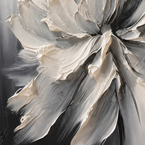 Close detail of lifted ivory petal edges against shaded gray and charcoal strokes.