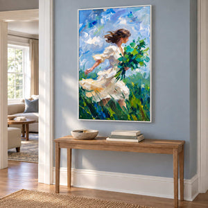 Walking into the Breeze in a white frame above a light wood hallway console against a pale blue wall.