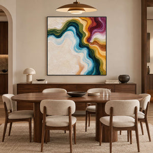 Square multicolored abstract above a dark wood sideboard and oval dining table.
