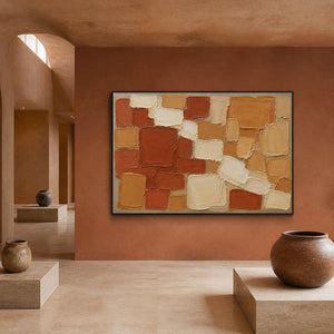 Terracotta, ochre, and cream painted blocks wall art in a contemporary hospitality lounge.