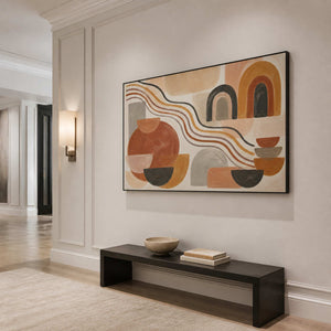 Horizontal boho wall art displayed above a minimalist entryway bench.