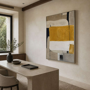 Vertical ochre abstract artwork bringing warmth to a quiet study.