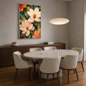 Warm botanical artwork above a natural modern dining room sideboard.